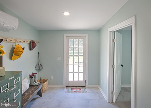 doorway to outside with vaulted ceiling, light tile patterned floors, and a wall unit AC