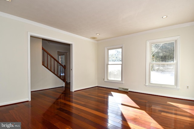 unfurnished room featuring dark hardwood / wood-style flooring and ornamental molding