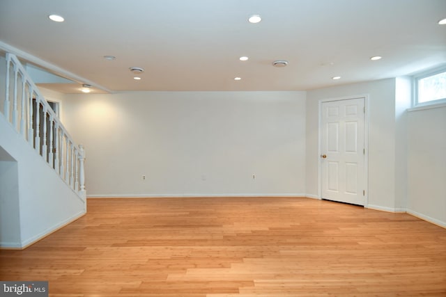 basement featuring light hardwood / wood-style floors