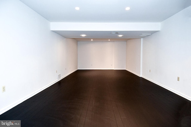 empty room featuring dark hardwood / wood-style floors