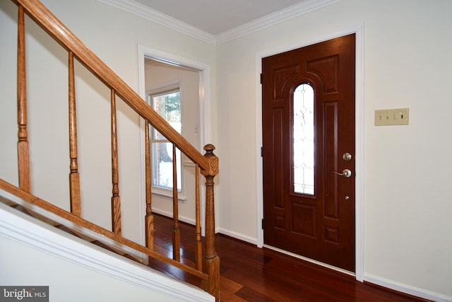 foyer entrance with wood-type flooring and ornamental molding