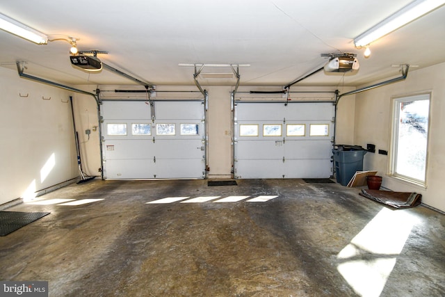 garage featuring a garage door opener