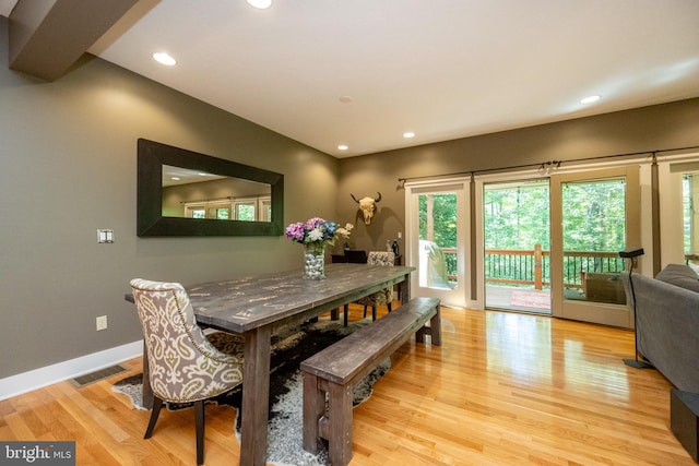 dining space featuring light hardwood / wood-style floors