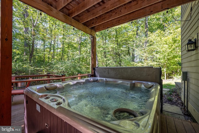 deck with a hot tub