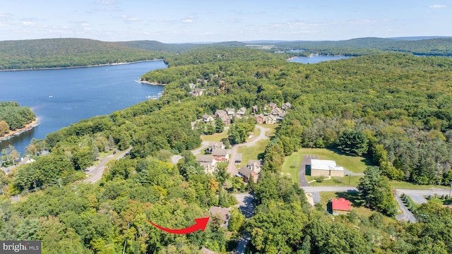 birds eye view of property featuring a water view