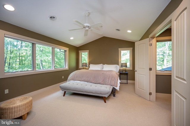 carpeted bedroom featuring vaulted ceiling and ceiling fan