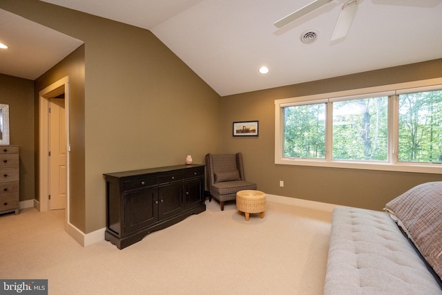 carpeted bedroom featuring vaulted ceiling and ceiling fan