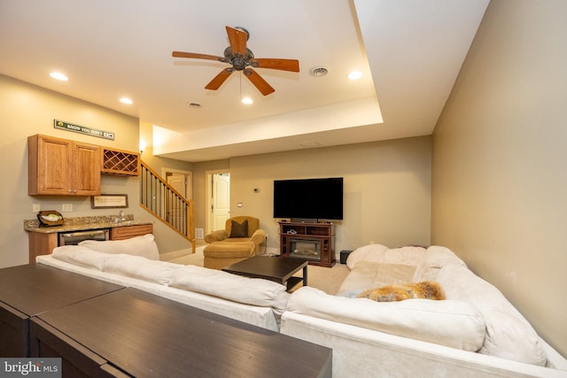 living room featuring ceiling fan