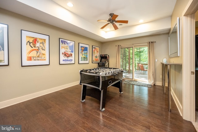 game room featuring ceiling fan and dark hardwood / wood-style flooring