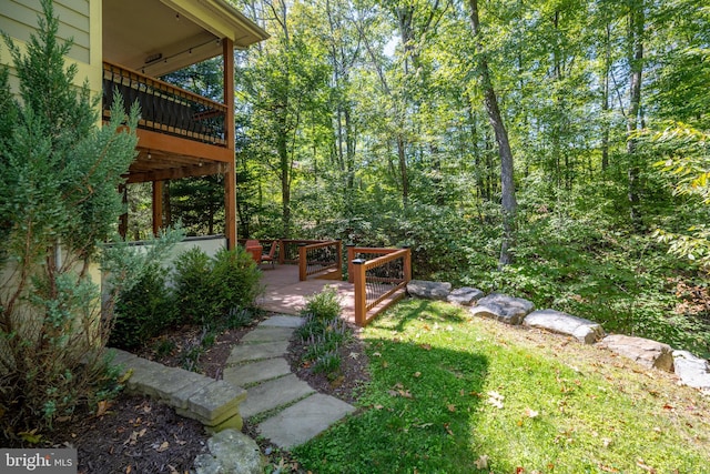 view of yard with a deck