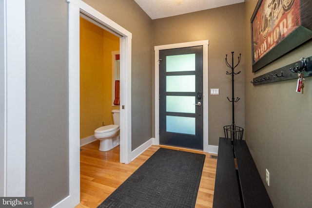 entrance foyer with hardwood / wood-style floors