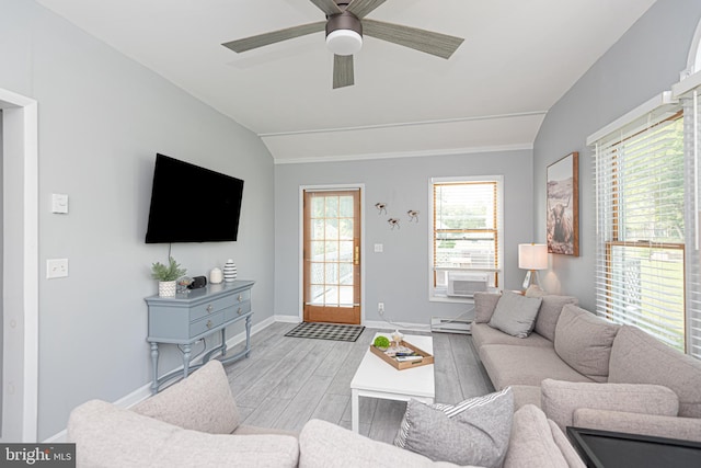 living room featuring cooling unit, a baseboard radiator, ceiling fan, vaulted ceiling, and light hardwood / wood-style floors