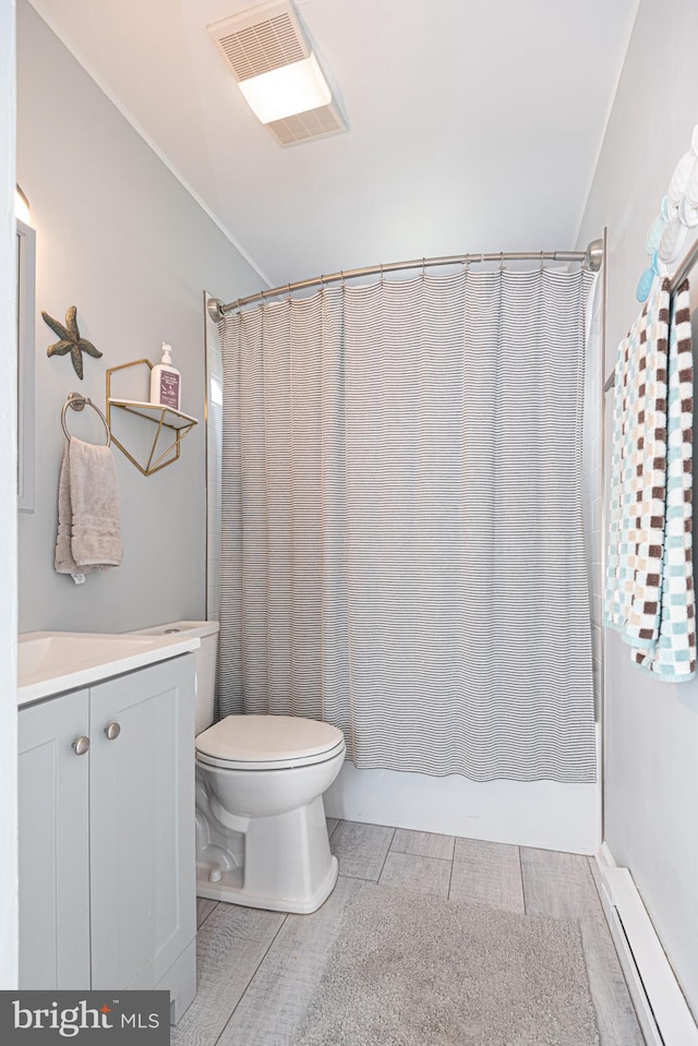 bathroom with tile patterned floors, toilet, a shower with curtain, a baseboard radiator, and vanity