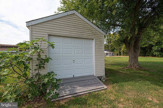 garage with a yard