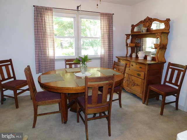 view of carpeted dining space