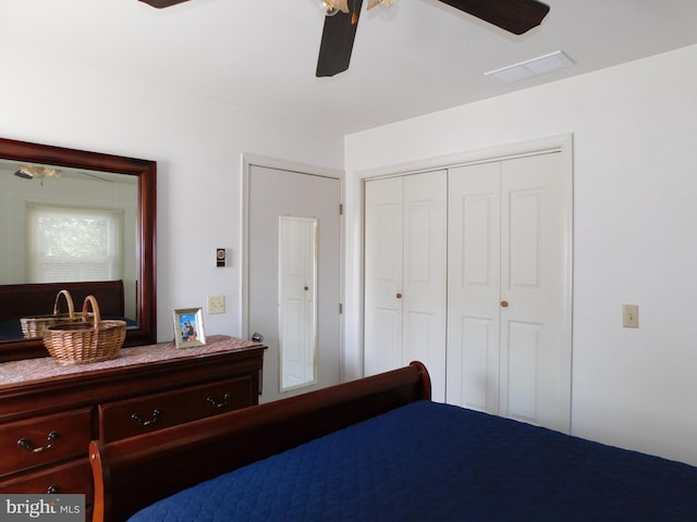 bedroom featuring ceiling fan and a closet