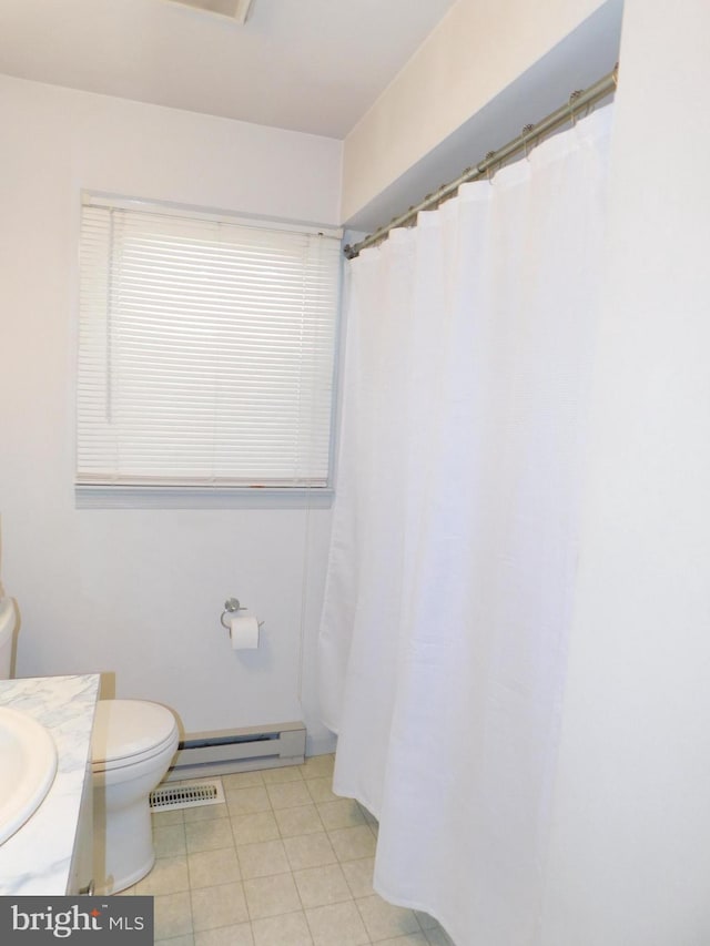 bathroom with curtained shower, vanity, a baseboard radiator, toilet, and tile patterned floors