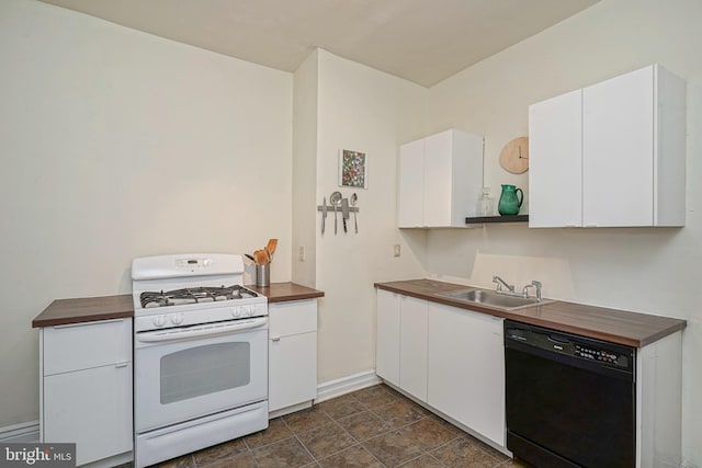 kitchen with dishwasher, white gas range oven, white cabinetry, and sink