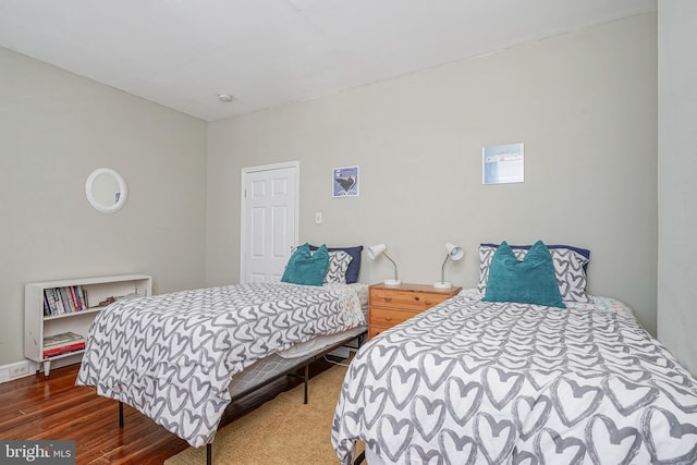 bedroom featuring dark hardwood / wood-style floors