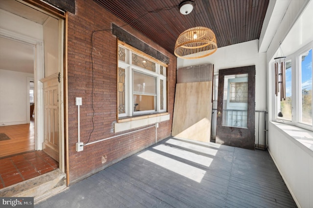 interior space featuring wood ceiling