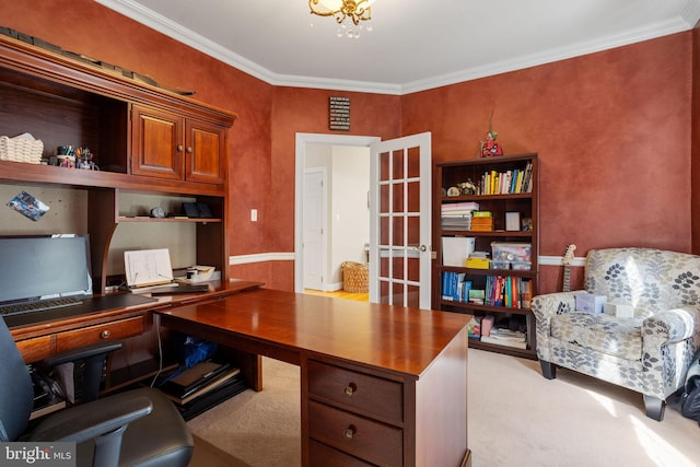 carpeted home office featuring crown molding