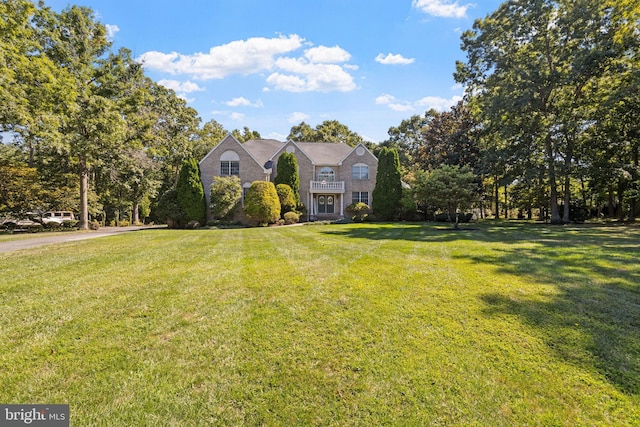 view of front facade with a front lawn