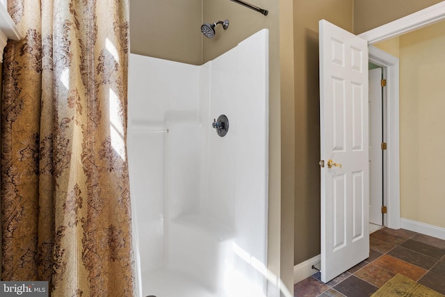 bathroom featuring a shower with curtain