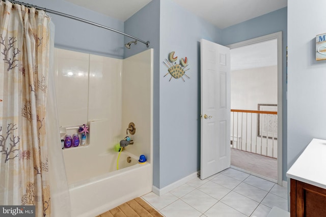 bathroom featuring vanity, tile patterned flooring, and shower / bath combo with shower curtain