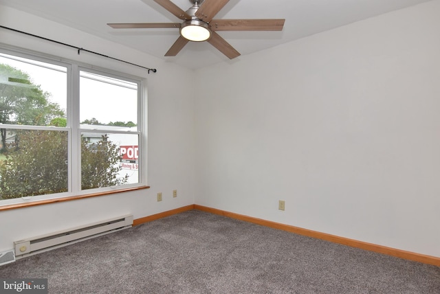 carpeted spare room with a baseboard heating unit and ceiling fan