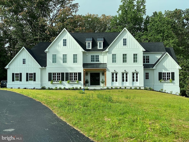 view of front of home with a front yard