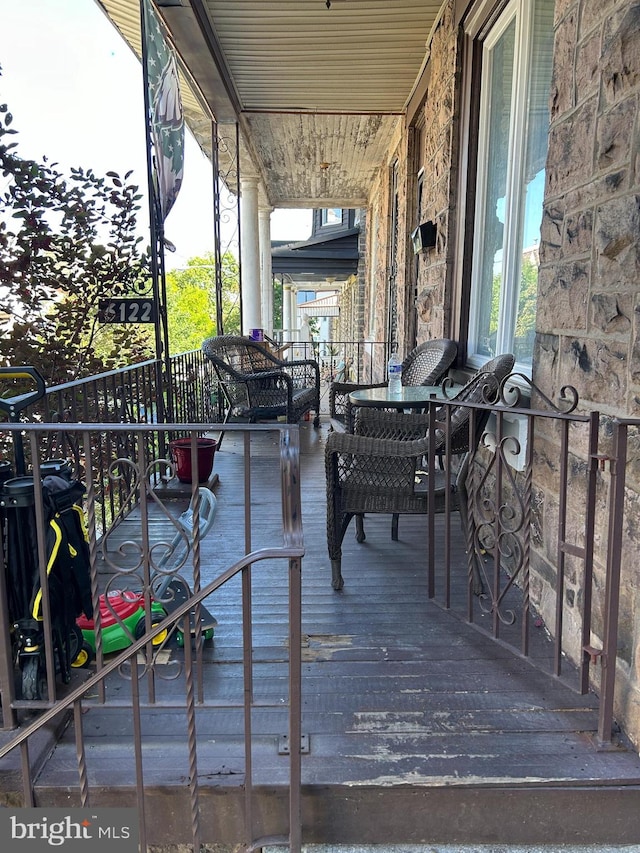 deck with covered porch