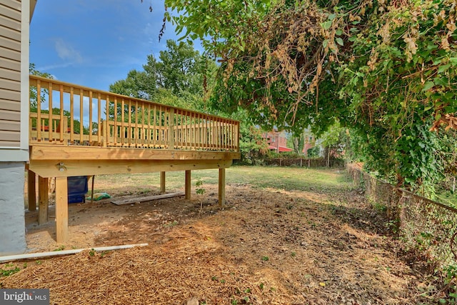 view of yard with a wooden deck