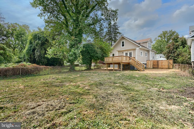 view of yard featuring a deck