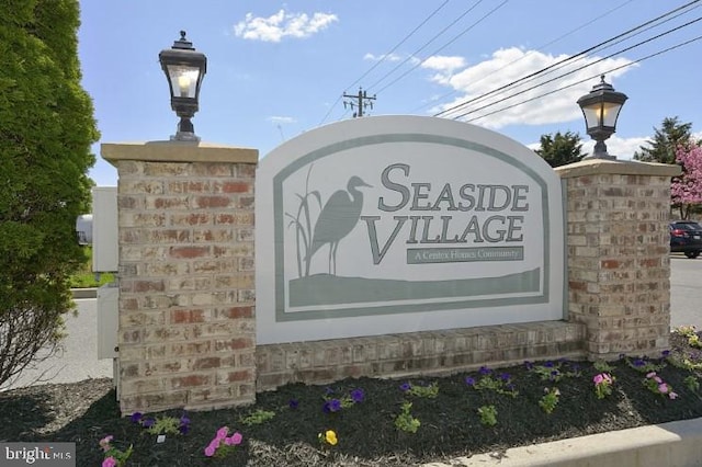 view of community sign