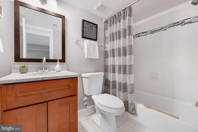 full bathroom featuring tile patterned floors, shower / bath combo, vanity, and toilet