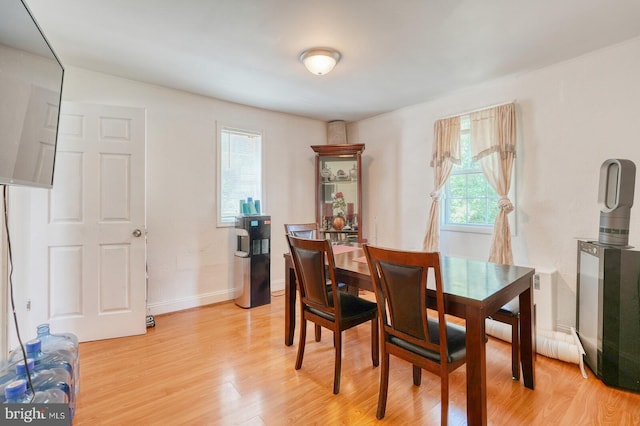 dining room featuring light hardwood / wood-style flooring