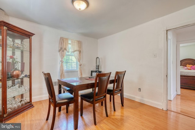 dining area featuring light hardwood / wood-style floors