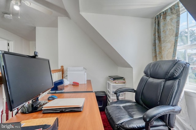 office space featuring a wealth of natural light and ceiling fan