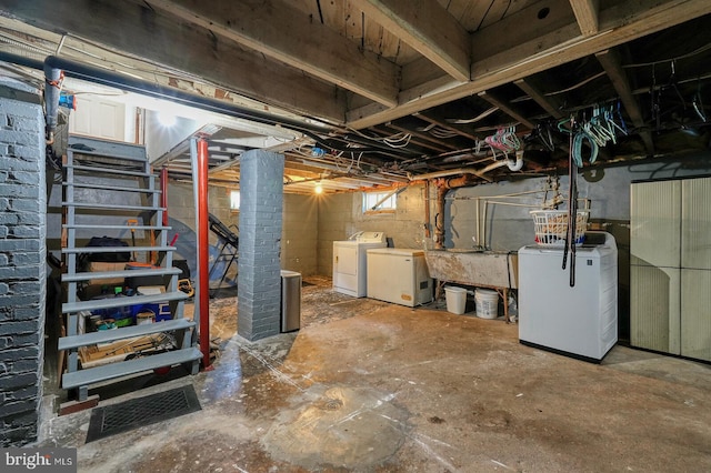 basement featuring independent washer and dryer