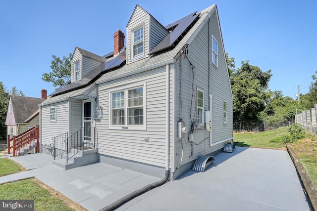 rear view of property with a patio area