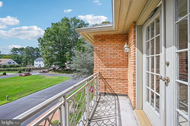 rear view of property featuring a patio area