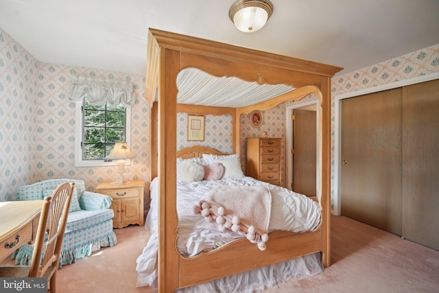 carpeted bedroom with a closet