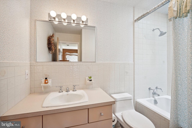 full bathroom with shower / bath combo, vanity, and toilet