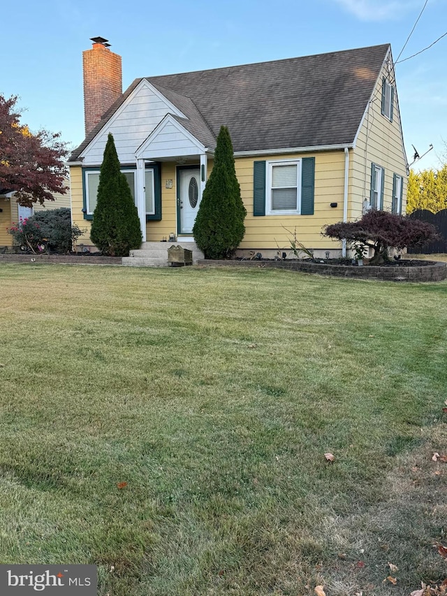 view of front of property with a front lawn