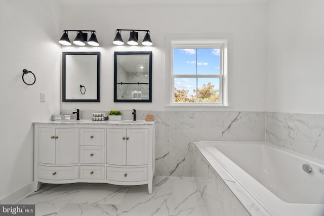 bathroom featuring a bathing tub and vanity