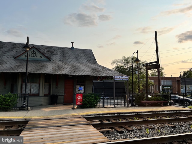 view of back house at dusk