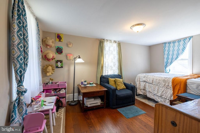 bedroom featuring dark hardwood / wood-style floors