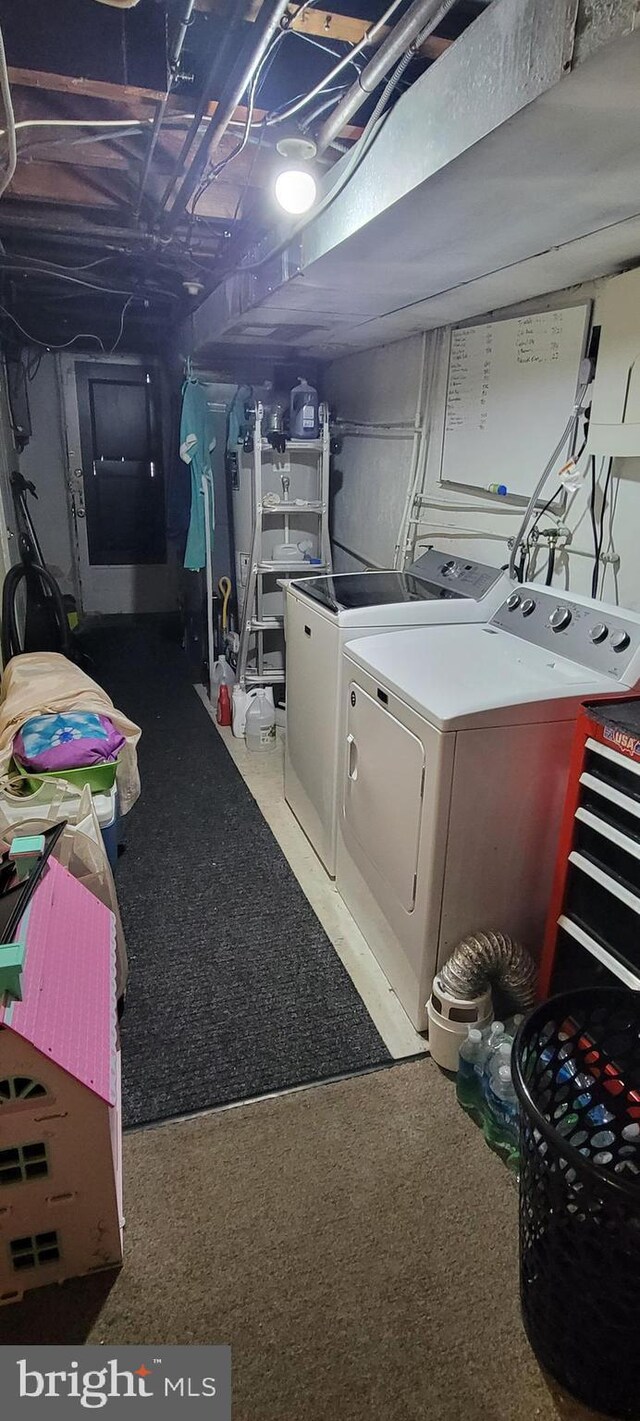 basement with separate washer and dryer