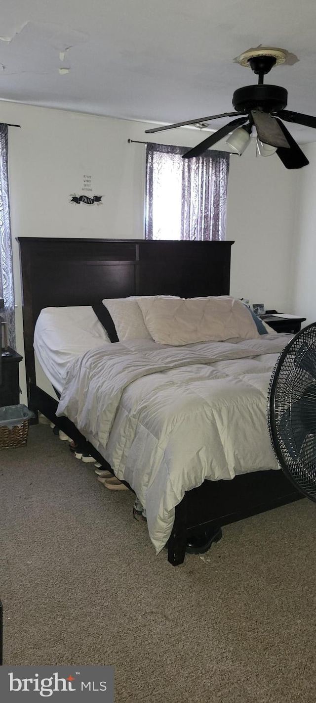 bedroom with carpet and ceiling fan