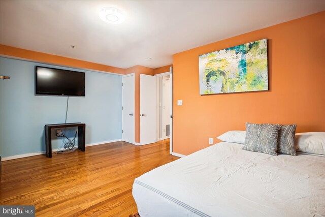 bedroom featuring hardwood / wood-style floors